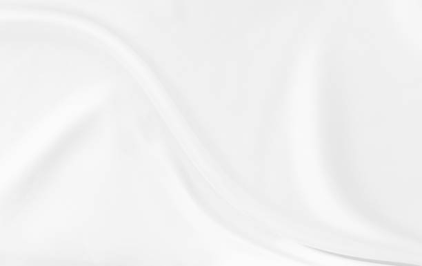 istock White gray satin texture that is white silver fabric silk panoramic background with beautiful soft blur pattern natural. 2002024323