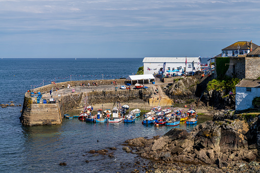 Coverack, Cornwall, England, UK - June 03, 2022: The harbour and the old Lifeboat House