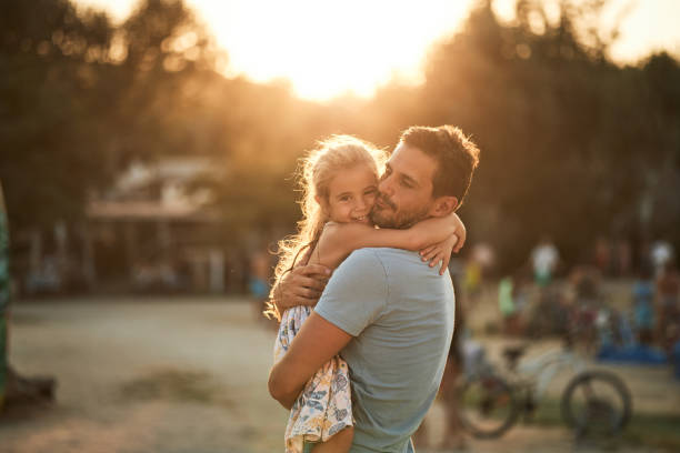 istock Beautiful father and daughter enjoying summer vacation 2002039689