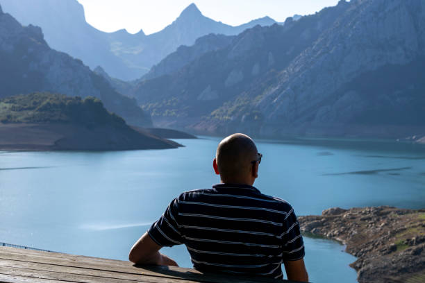 Free Stock Photo of Man overlooking a serene lake landscape | Download ...