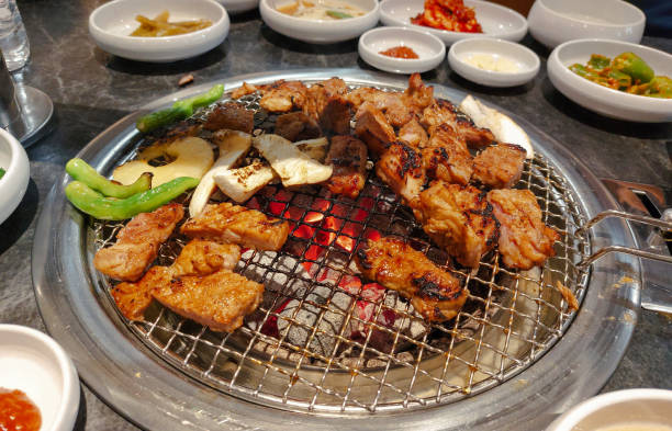 istock Korean BBQ Marinated Pork Ribs Grilled Over Charcoal Grill 2002058933