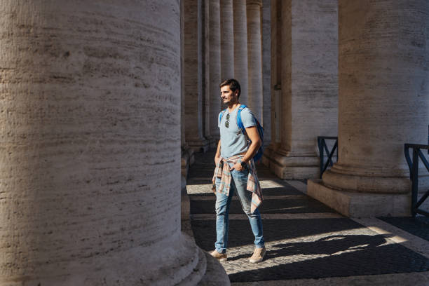 istock Young male tourist exploring big city 2002066566