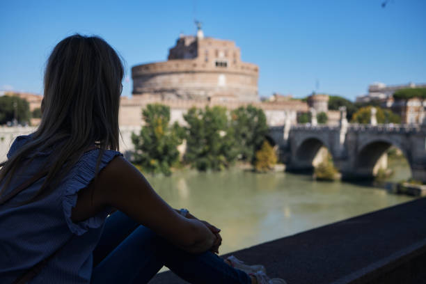 istock Young female tourist exploring big city 2002070200