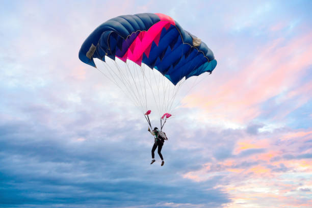 Manado, North Sulawesi, Indonesia, 09/23/2011. Paratroopers in action. The Paratroopers are doing extreme sports in the air
