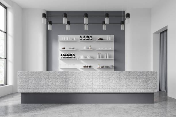 istock Modern cafe interior with stone bar counter and shelf with dishes, window 2002086976