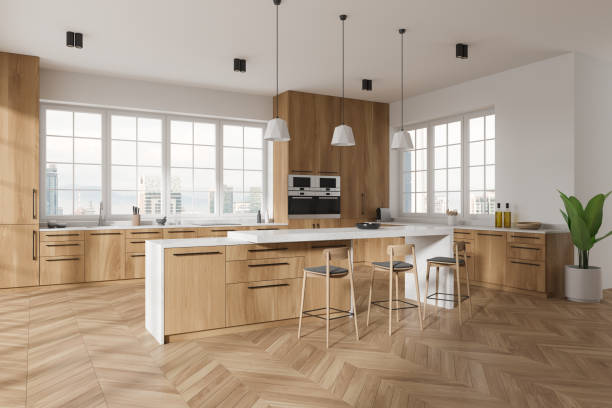 istock Stylish home kitchen interior with bar counter and cabinet, panoramic window 2002087493