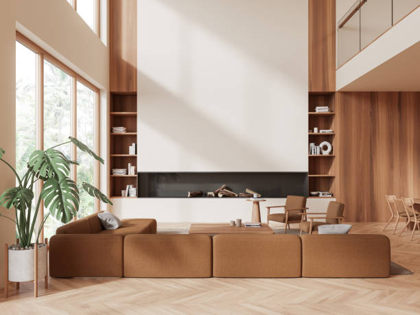 istock Beige home living room interior with sofa and fireplace, window. Mock up wall 2002089066