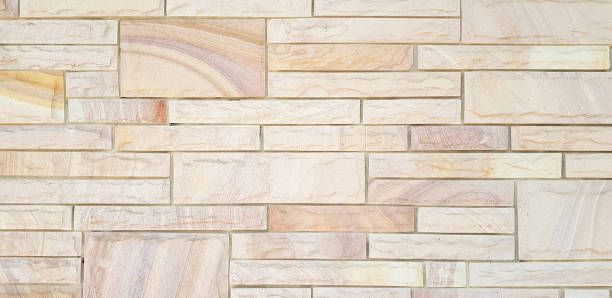 istock Light brown vintage brick wall or tile floor for background. Wallpaper, Line and Pattern concept 2002090671