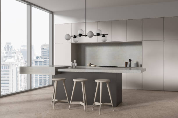 istock Corner view of home kitchen interior with bar counter and cabinet, window 2002102331
