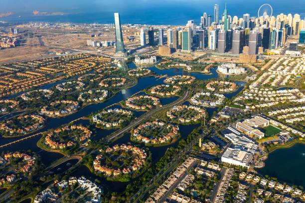 Jumeirah Islands Community in Dubai Jumeirah Islands Community with Dubai skyscrapers in background dubai island stock pictures, royalty-free photos & images