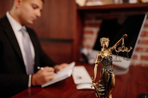 Lady justice at lawyers office