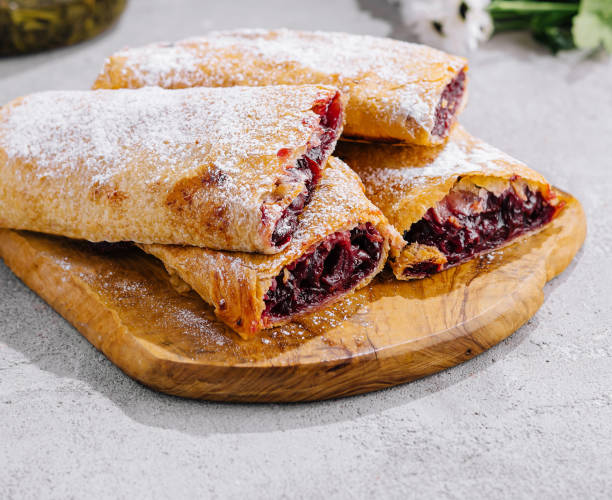 istock flaky puff pastries, filled with sweet cherry filling 2002177811