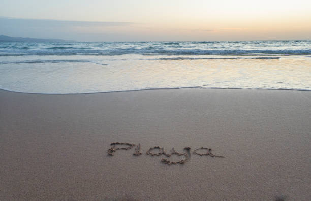 istock 'Playa' 'Beach' Written in the Sand 2002179447