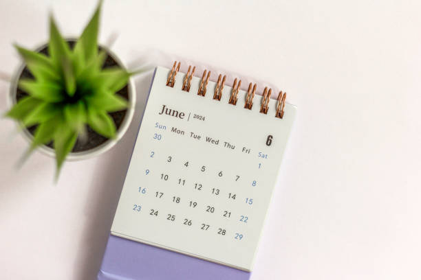 Desk calendar for June 2024 on a white background.