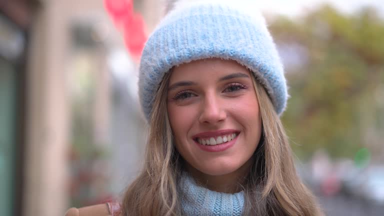 Smiling Young Woman in Winter Attire