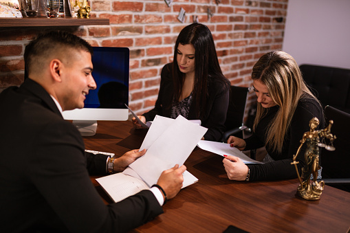 Discussing legal issues at the lawyer office