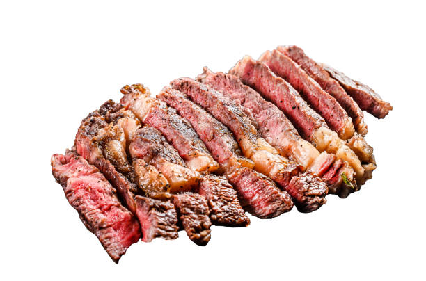 Grilled sliced Steak Rib eye with Pepper.  Isolated on white background. Top view