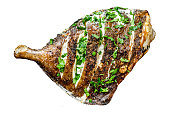Grilled John Dory fish with lime and parsley Isolated on white background. Top view.