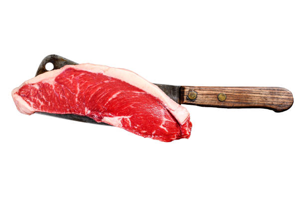 Raw sirloin steak on a cleaver. Marble beef.  Isolated on white background. Top view