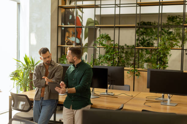 istock Collaborative Discussion in a Modern Office With Exposed Brick Walls 2002271430