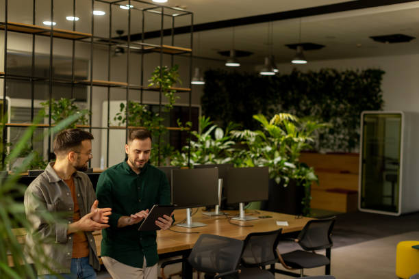 istock Collaborative Discussion in a Modern Office With Exposed Brick Walls 2002271441