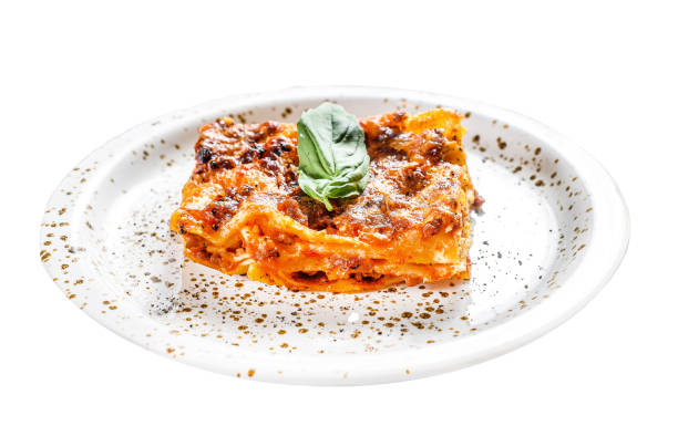 istock Traditional lasagna made with minced beef, bolognese and bechamel sauces.  Isolated on white background. Top view. 2002293431