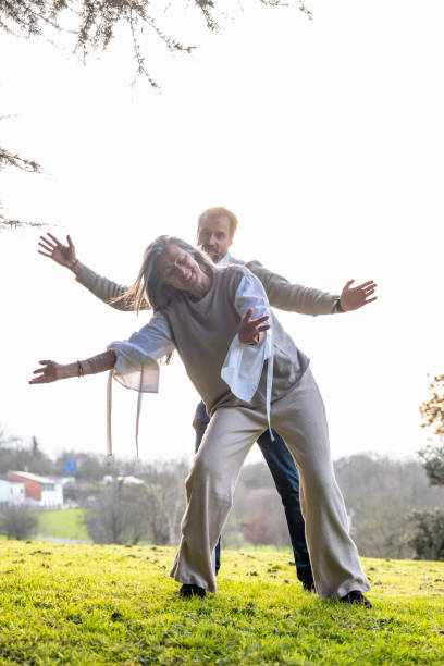 istock A woman and a middle-aged man practising neurodance 2002312020
