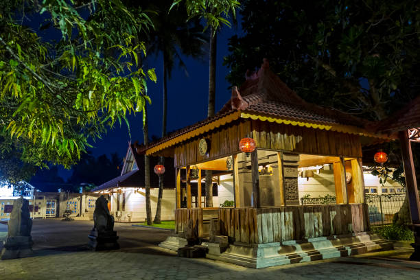 istock Indonesia Buddhist Monastery wooden temple at night 2002322597
