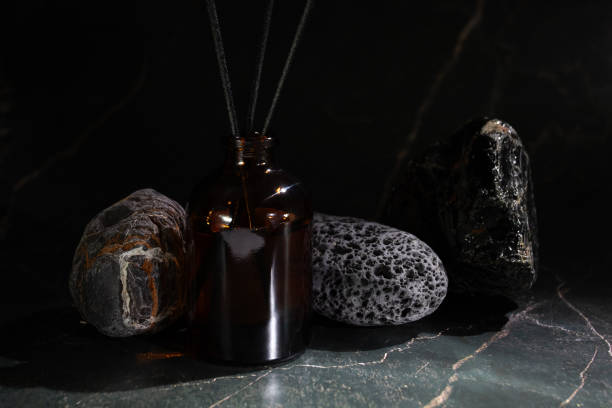 istock Aroma diffuser with natural stones, spa atmosphere, essential oil therapy, relaxation ritual 2002333225