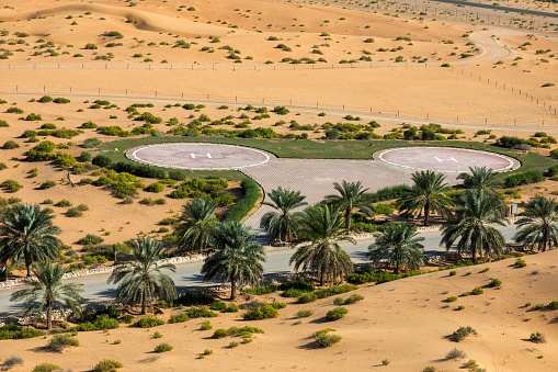 Heliport in the middle of desert and palm trees, Al Ain - Abu Dhabi