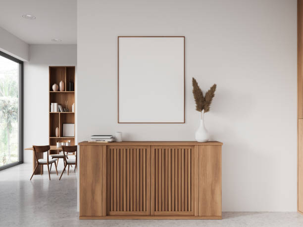 istock White hotel living room interior with drawer and dining table, mockup frame 2002360529