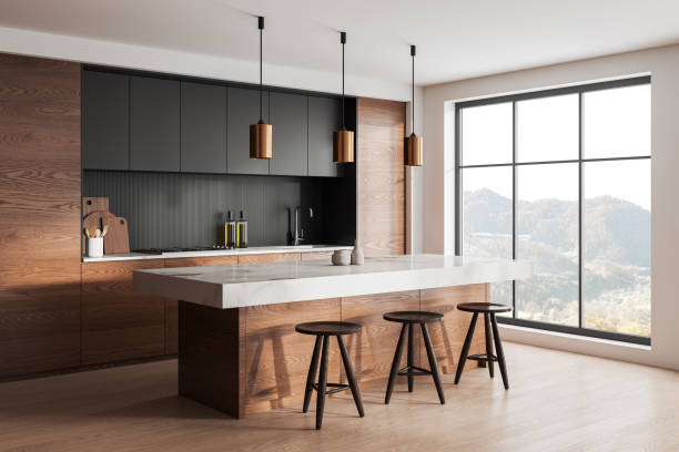 istock Home kitchen interior with bar counter and seats, cabinet and panoramic window 2002360573