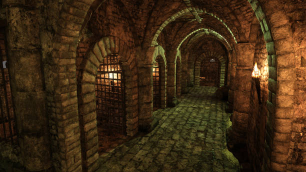 istock Passage in an old medieval castle dungeon with a row of empty jail cells. 3D illustration. 2002361218