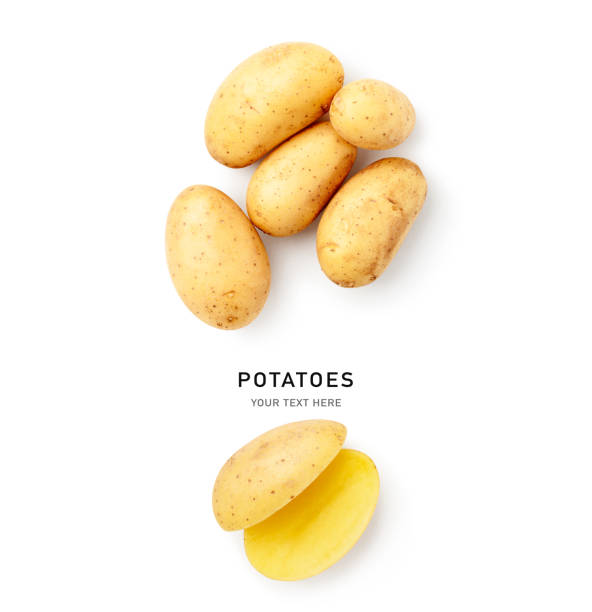 Raw new potatoes pile top view isolated on white background