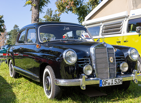 Morimondo, Italy - September 10, 2023: Parade of vintage cars through the streets of the city