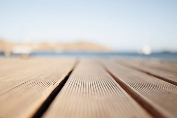 Focus on a wooden pier on Serifos beach, Cyclades, Greece
