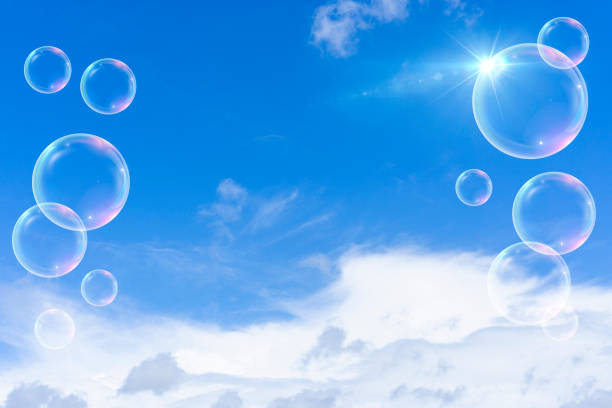 istock Background material of refreshing blue sky, clouds and sparkling soap bubbles 2002481428