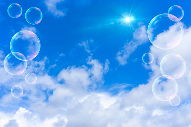 istock Background material of refreshing blue sky, clouds and sparkling soap bubbles 2002481965