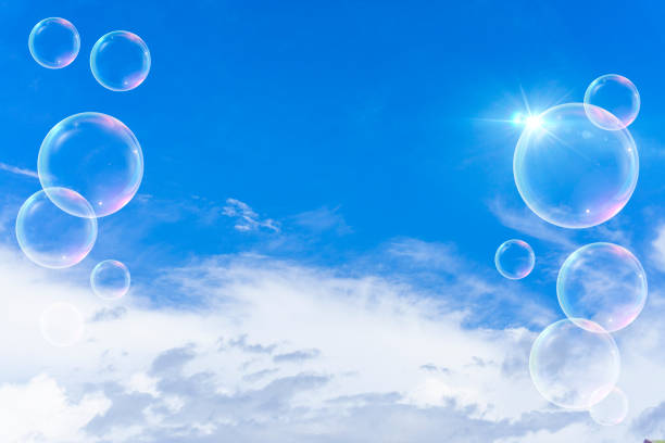 istock Background material of refreshing blue sky, clouds and sparkling soap bubbles 2002484060
