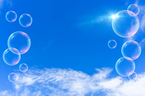 istock Background material of refreshing blue sky, clouds and sparkling soap bubbles 2002487327