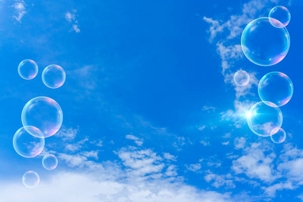istock Background material of refreshing blue sky, clouds and sparkling soap bubbles 2002488974
