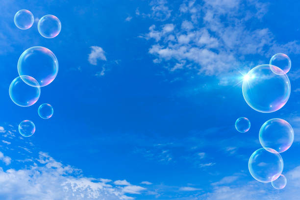 istock Background material of refreshing blue sky, clouds and sparkling soap bubbles 2002490061