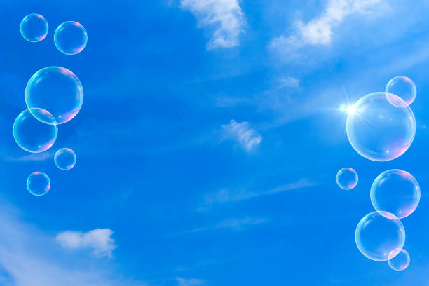 istock Background material of refreshing blue sky, clouds and sparkling soap bubbles 2002492295