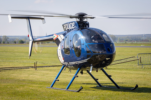 Fertöszentmiklos, Hungary - April 30, 2023: Police helicopter from Hungary preparing for takeoff