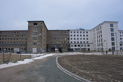 Binz, Germany - Jan 11, 2024: The Colossus of Prora was built by Nazi Germany between 1936 and 1939 as part of the Strength Through Joy project. Cloudy winter day. Selective focus