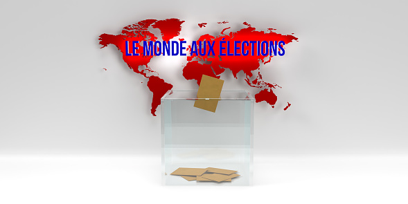 A transparent ballot box in front of a map of the world and a vote cast in it.\nAbove the map it says world at elections in French.\n2024 is a year in which elections almost all over the world coincide with the same year. This year, billions of people will go to the polls and vote for democracy.