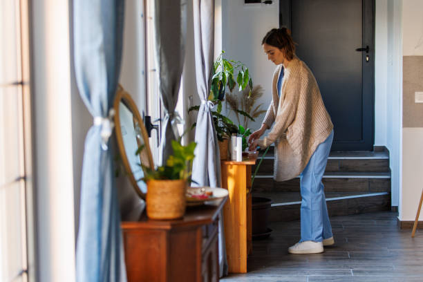 istock Nurse reaching for her ID card before heading out to work 2002543732