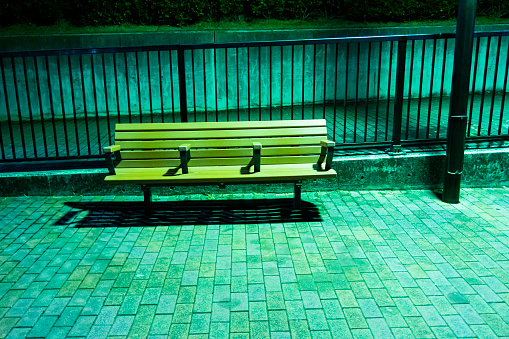 Bench on the street at night