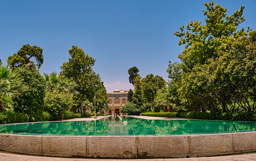 Tehran (Teheran) , Iran-June 24, 2023: Water pond and tree reflection water surface of Golestan Palace, Tehran, Iran.