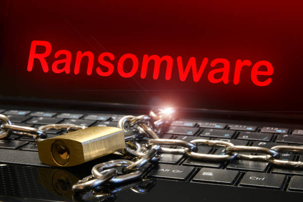 istock Computer security concept with an iron chain and padlock on the laptop keyboard and 